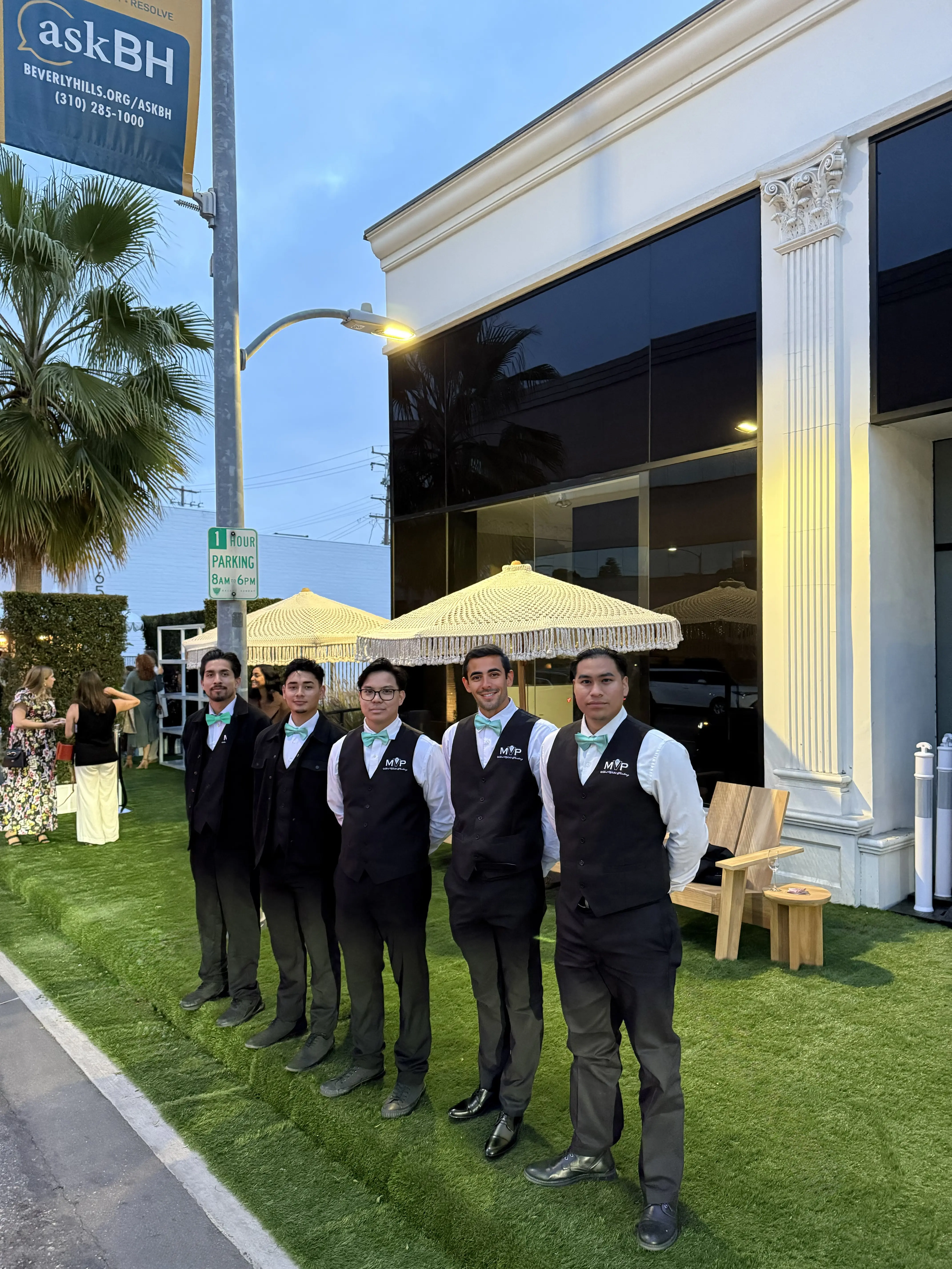Mint Valet Parking Services attendants standing ready in front of Theoni Collection Beverly Hills showroom for the grand opening. Valet Parking Beverly Hills done right.